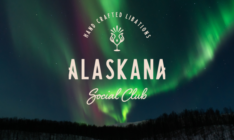 A mesmerizing display of the Northern Lights illuminates the night sky over a serene forest landscape in Mat-Su, Alaska