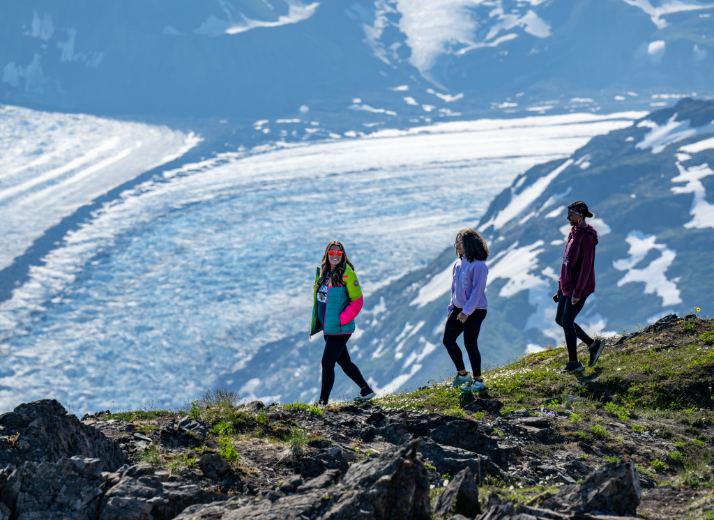three people enjoying a scenic hike in the mat-su alaska