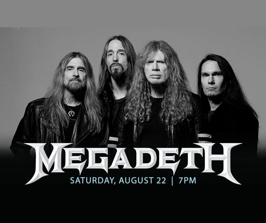 Four members of the heavy metal band Megadeth stand together in a row, dressed in black, with long hair and serious expressions in Mat-Su, Alaska