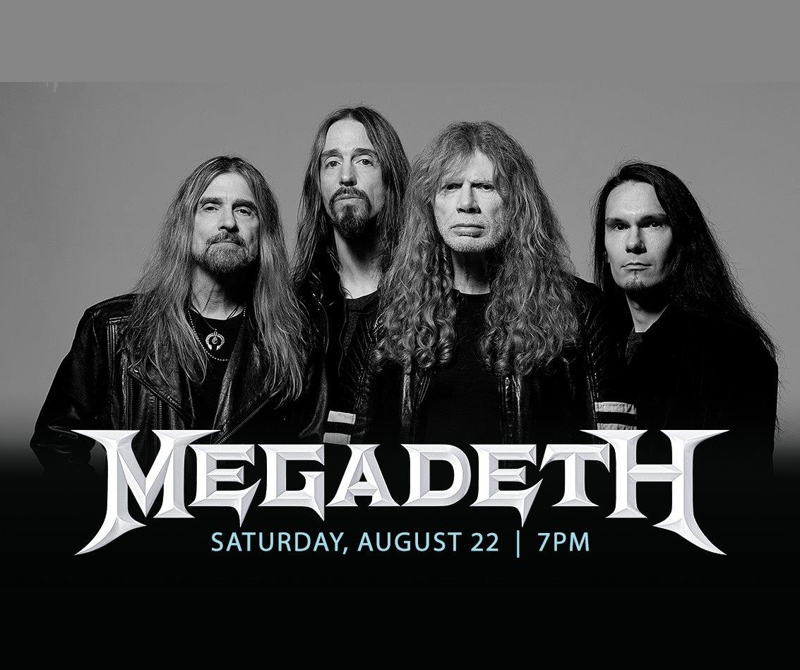 Four members of the heavy metal band Megadeth stand together in a row, dressed in black, with long hair and serious expressions in Mat-Su, Alaska
