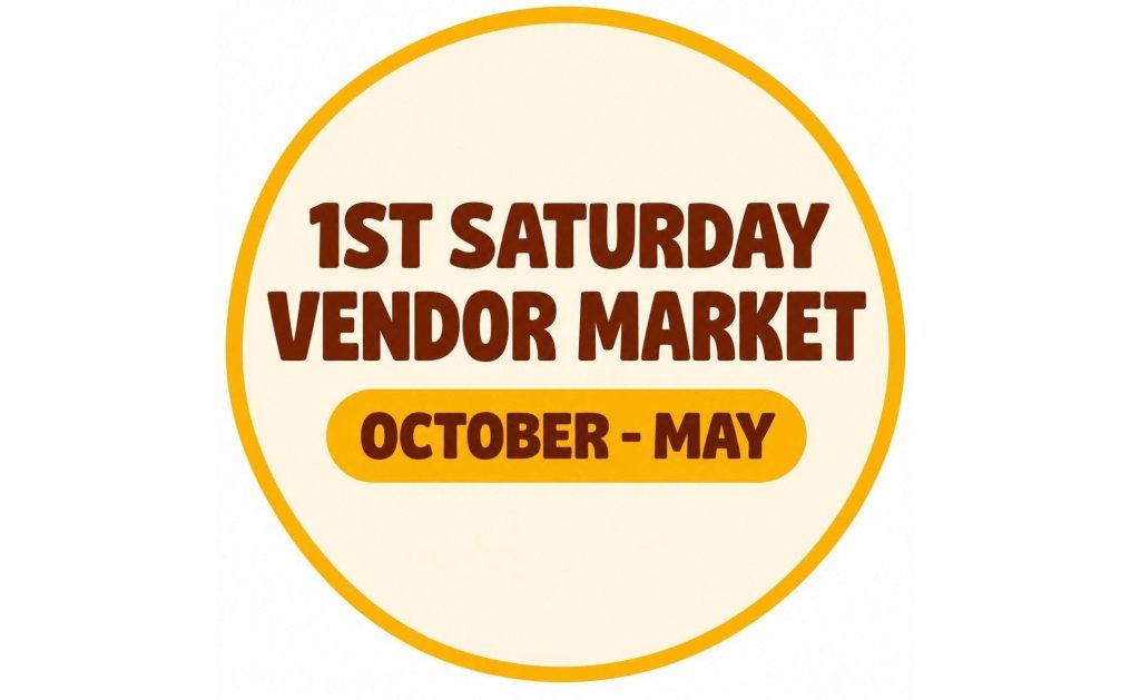 A circular sign advertising a 1st Saturday vendor market running from October to May in Mat-Su, Alaska